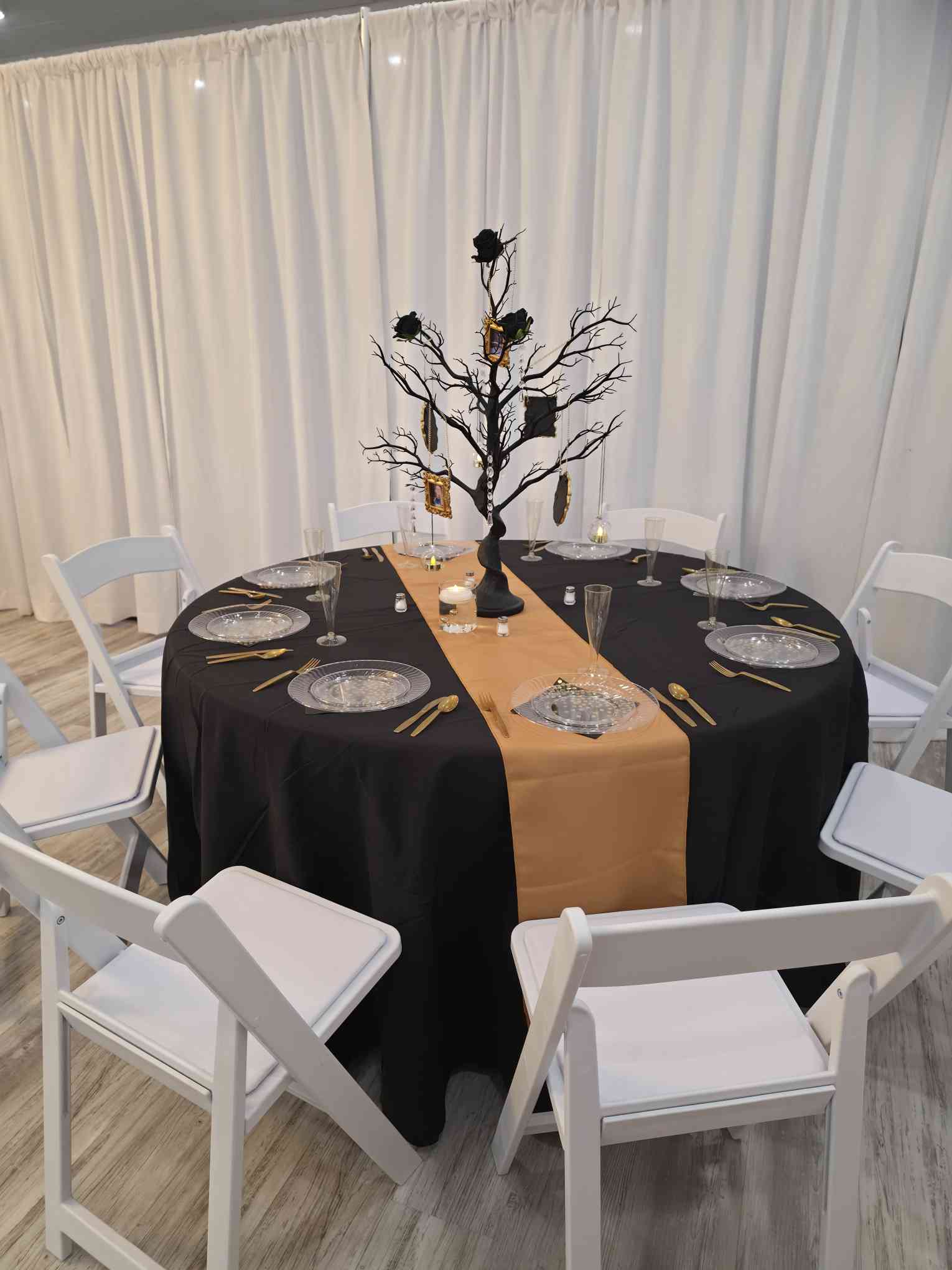 Wide celebration room at Event Palace with staged tables
